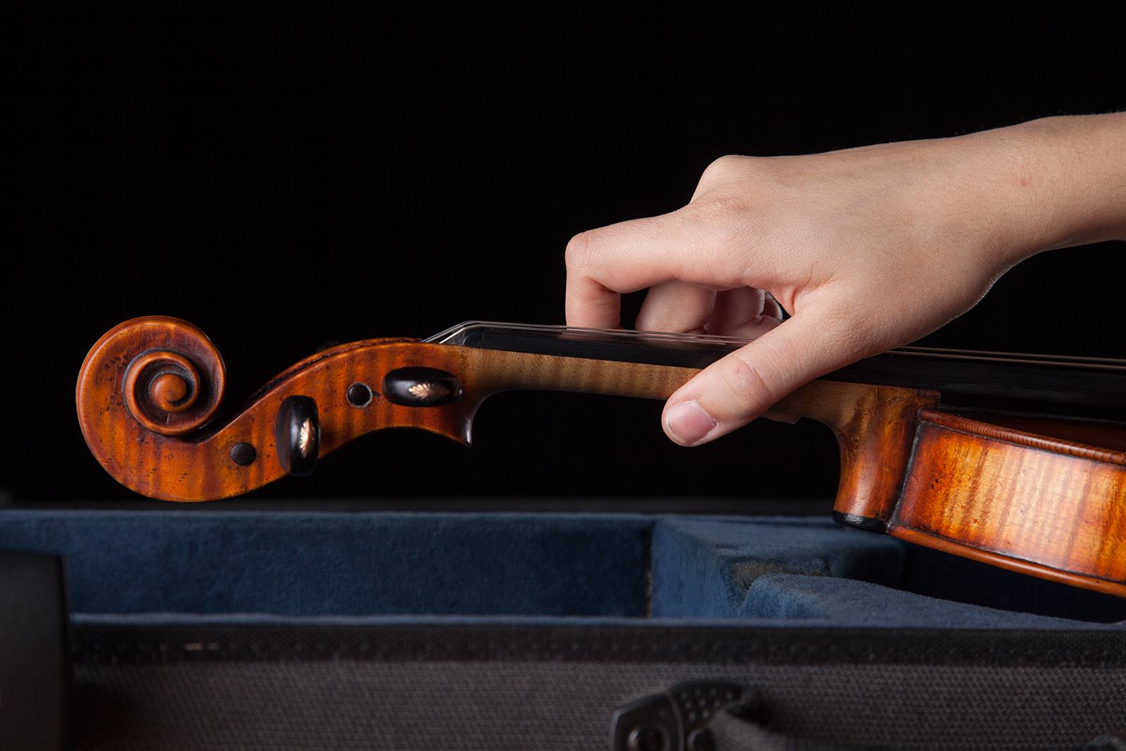 Violin and case.