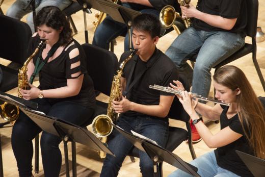 Jazz ensemble performs on stage.