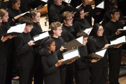 A choir group singing at the Clarice.