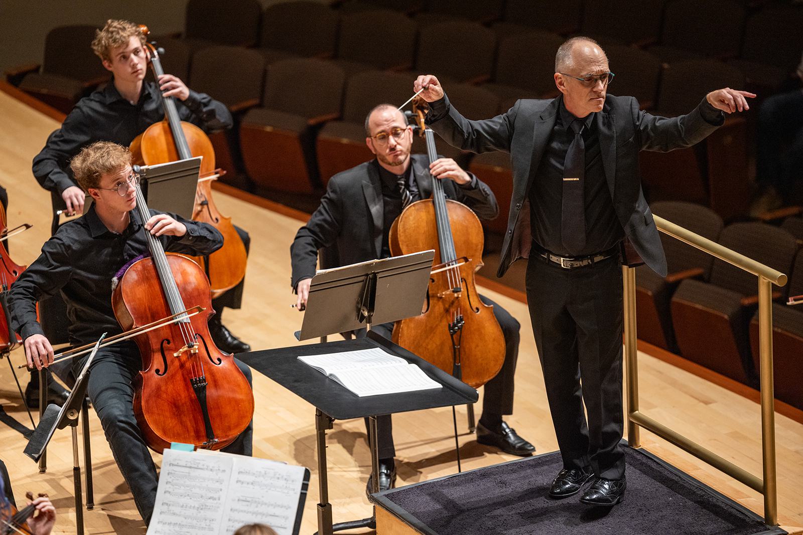 David Neely conducts members of the UMD Symphony Orchestra during a concert.