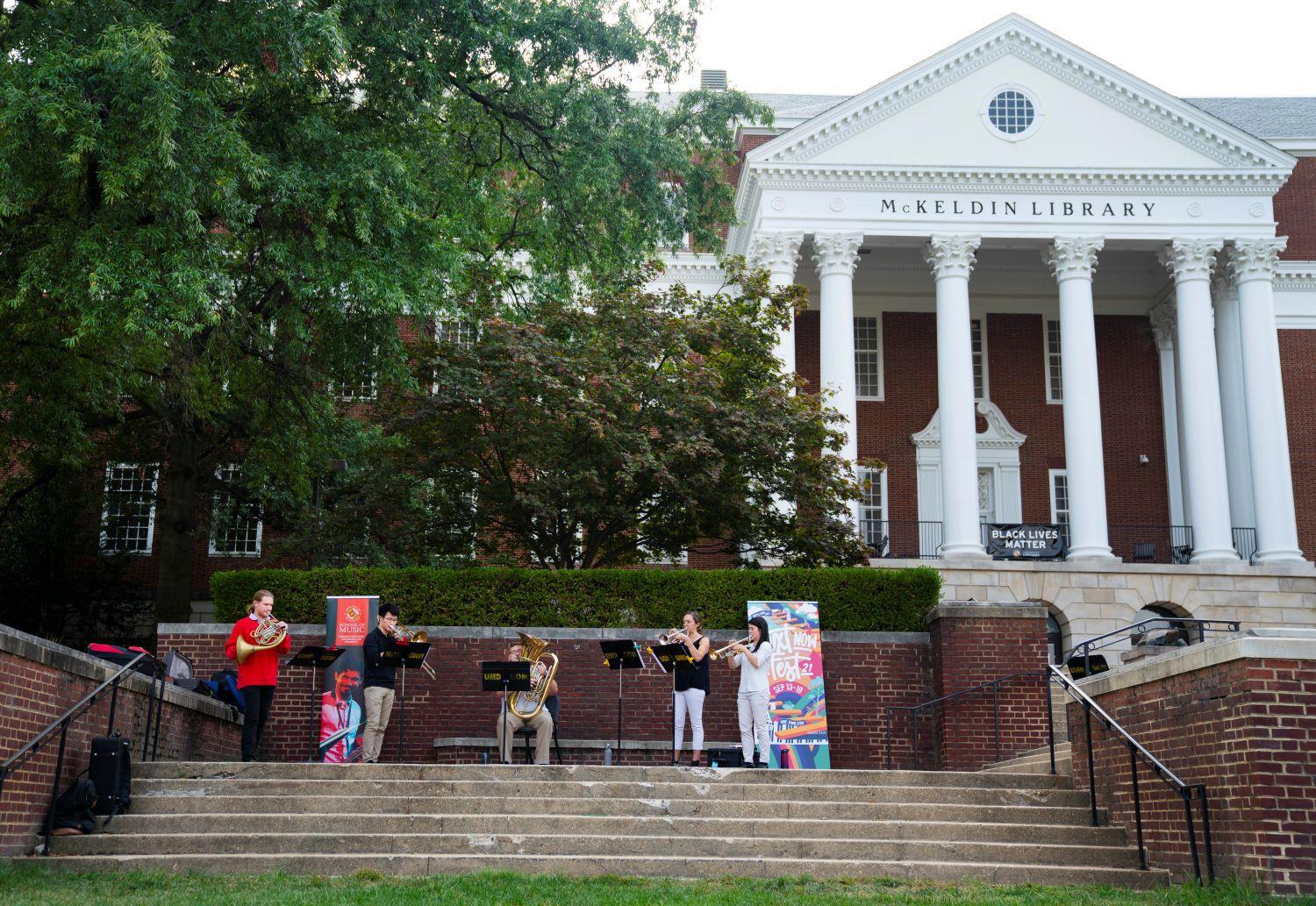 Terrapin Brass performs on the steps of McKeldin Library on the Mall.