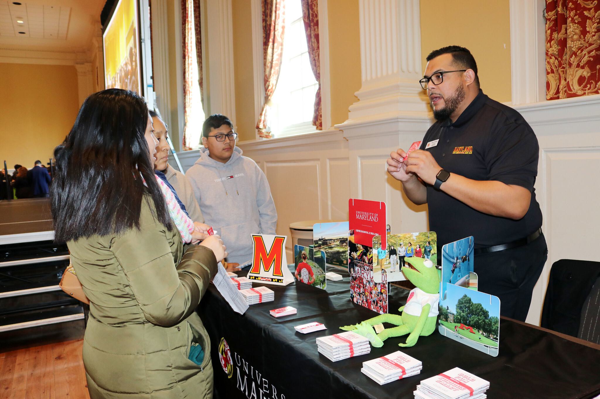 UMD employee talking to families