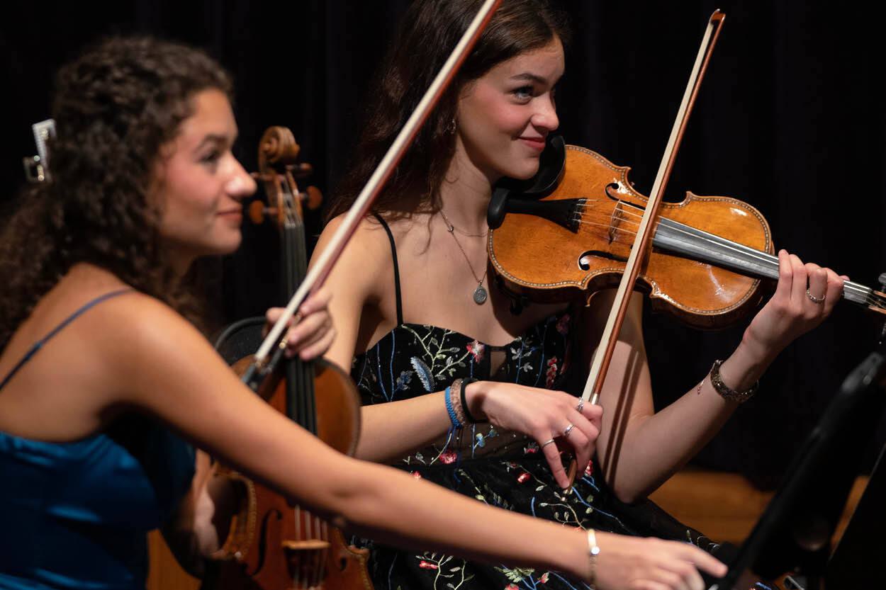 Two violin players.
