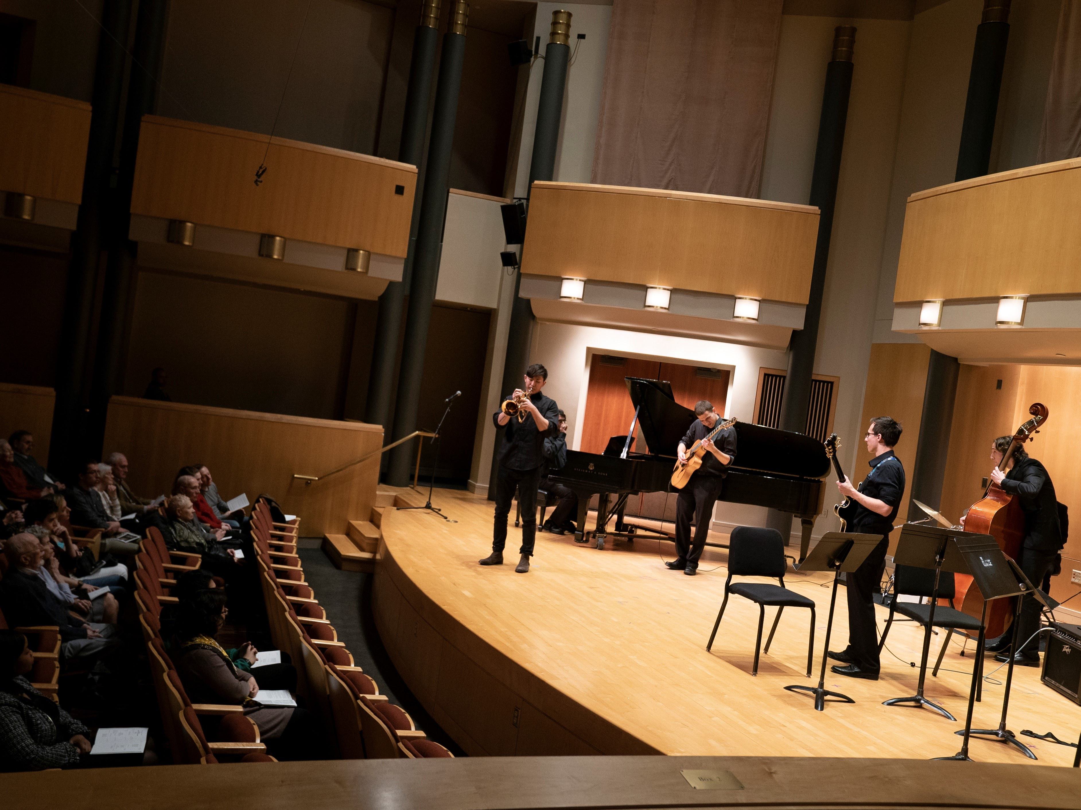 Students perform on stage at The Clarice.