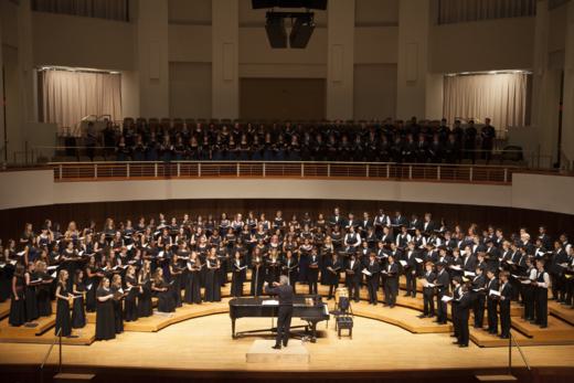 High school choirs perform on stage at The Clarice.