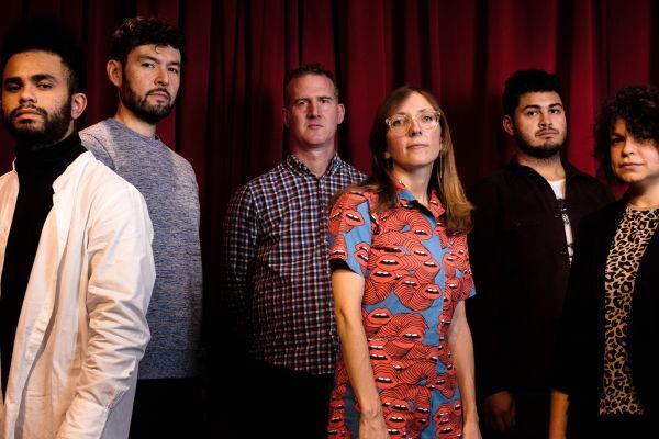 Mary Halvorson, Patricia Brennan, Nick Dunston, Tomas Fujiwara,, Jacob Garchik, and Adam O’Farrill pose for a photo.