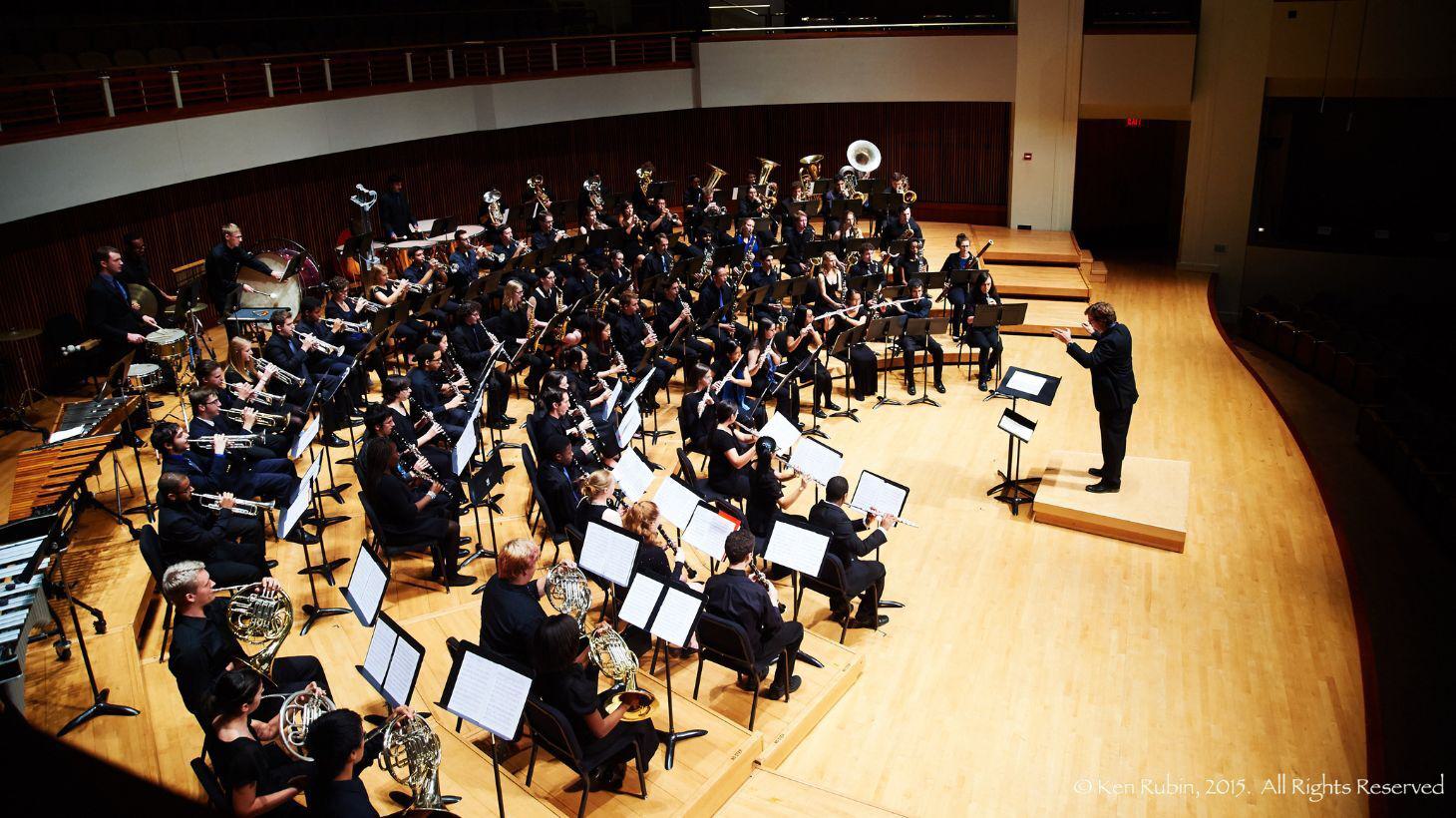 The University Band plays on stage.