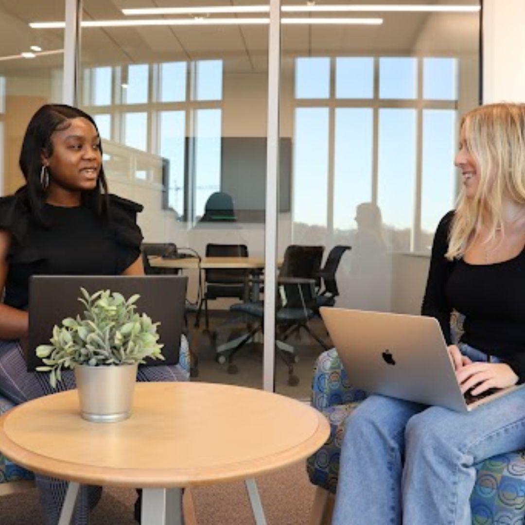 Two women collaborating
