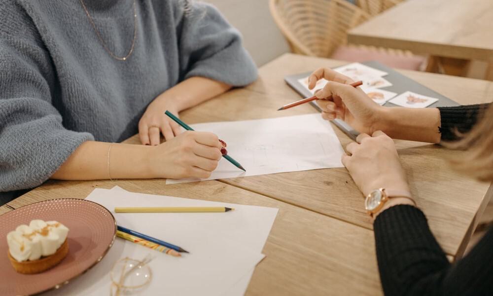 People Writing and Sketching