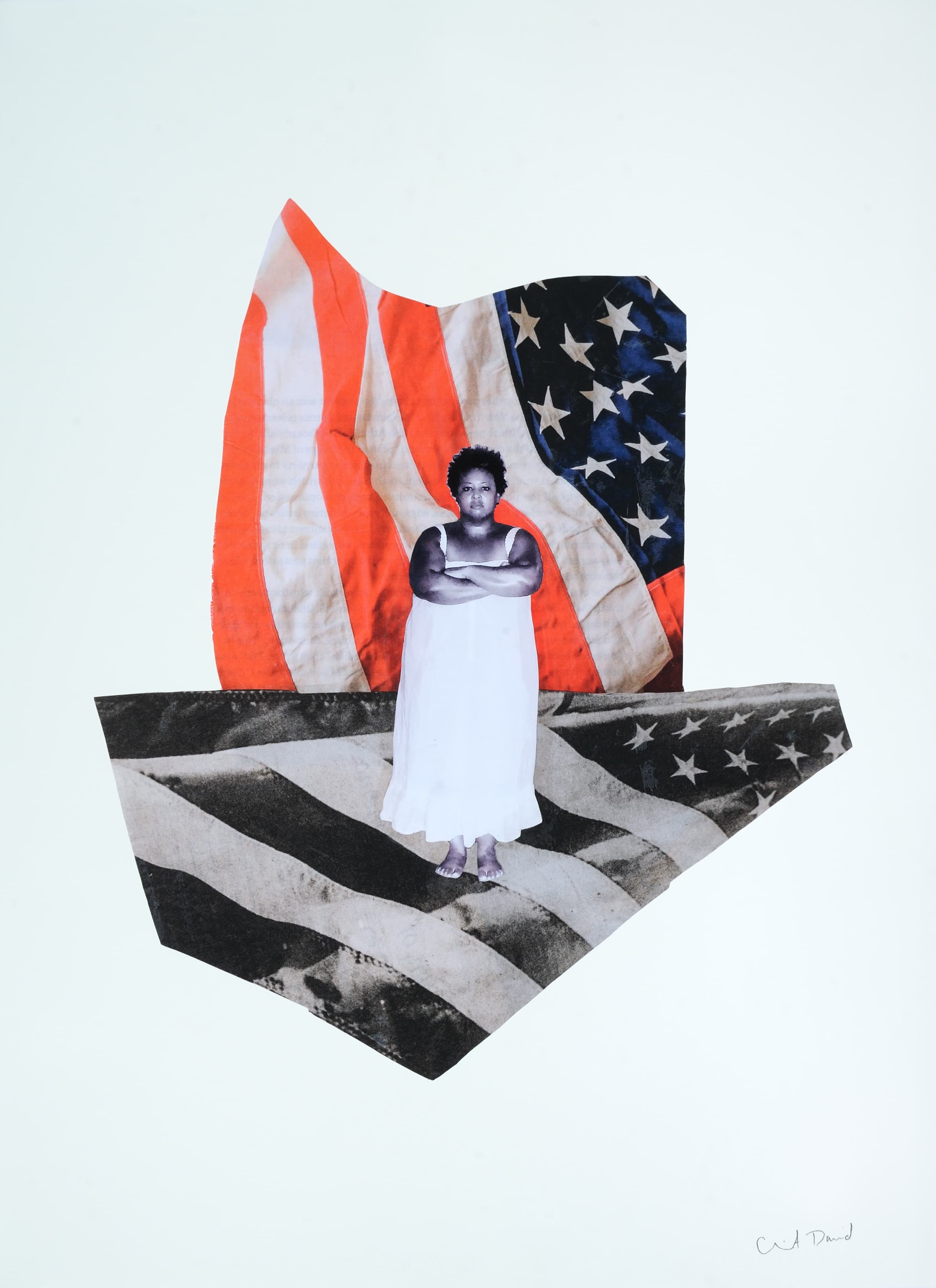 Black woman in a white dress stands with crossed arms over a collage ofAmerican flags, combining color and black-and-white elements.