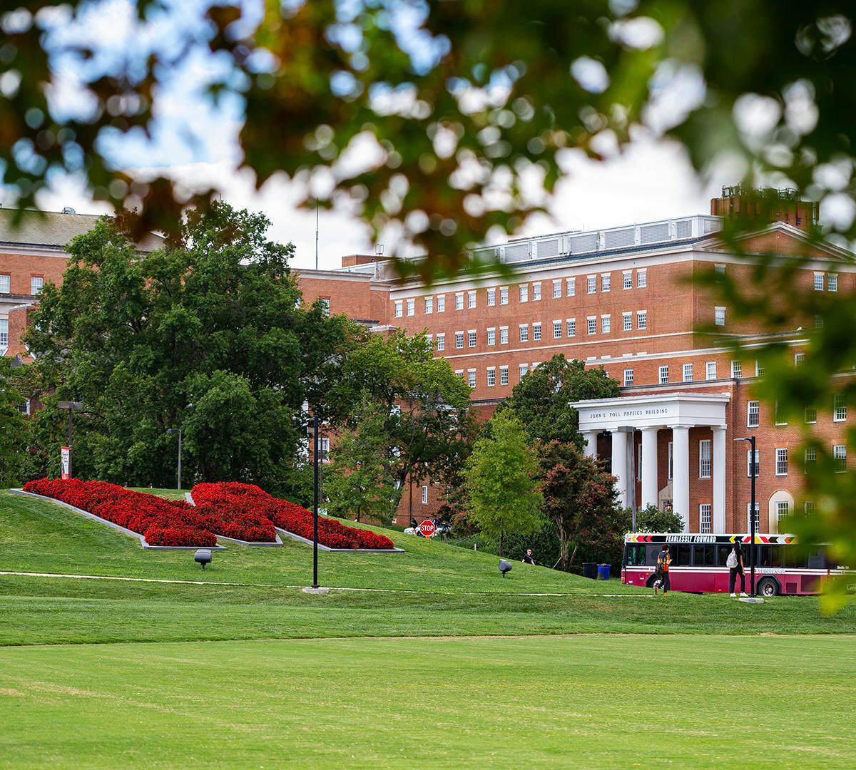 The iconic M circle, adorned with red flowers.